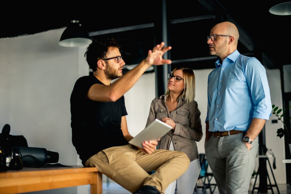 Employees discussing