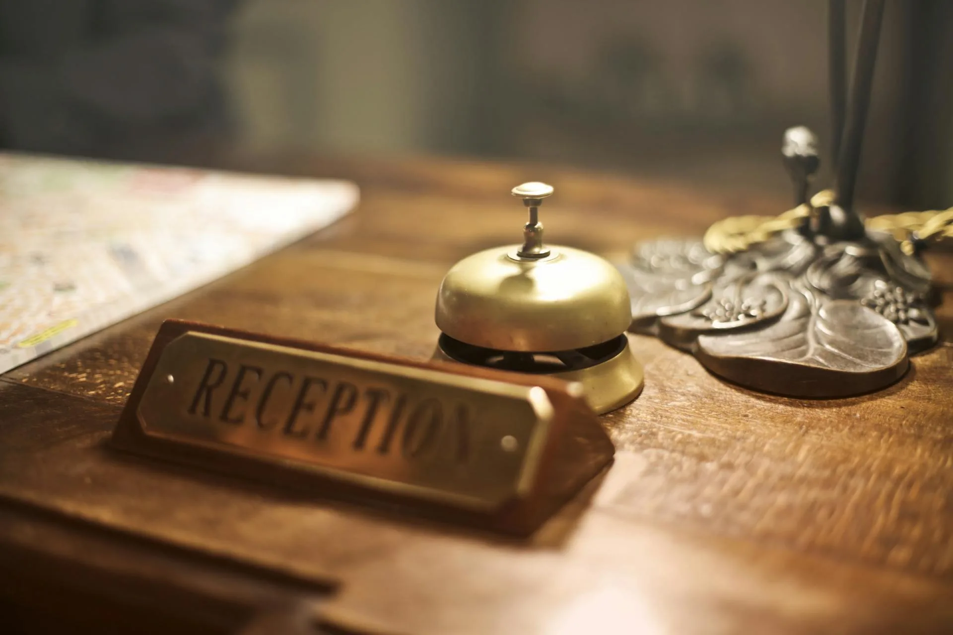 before AI guest experience - hotel reception desk bell