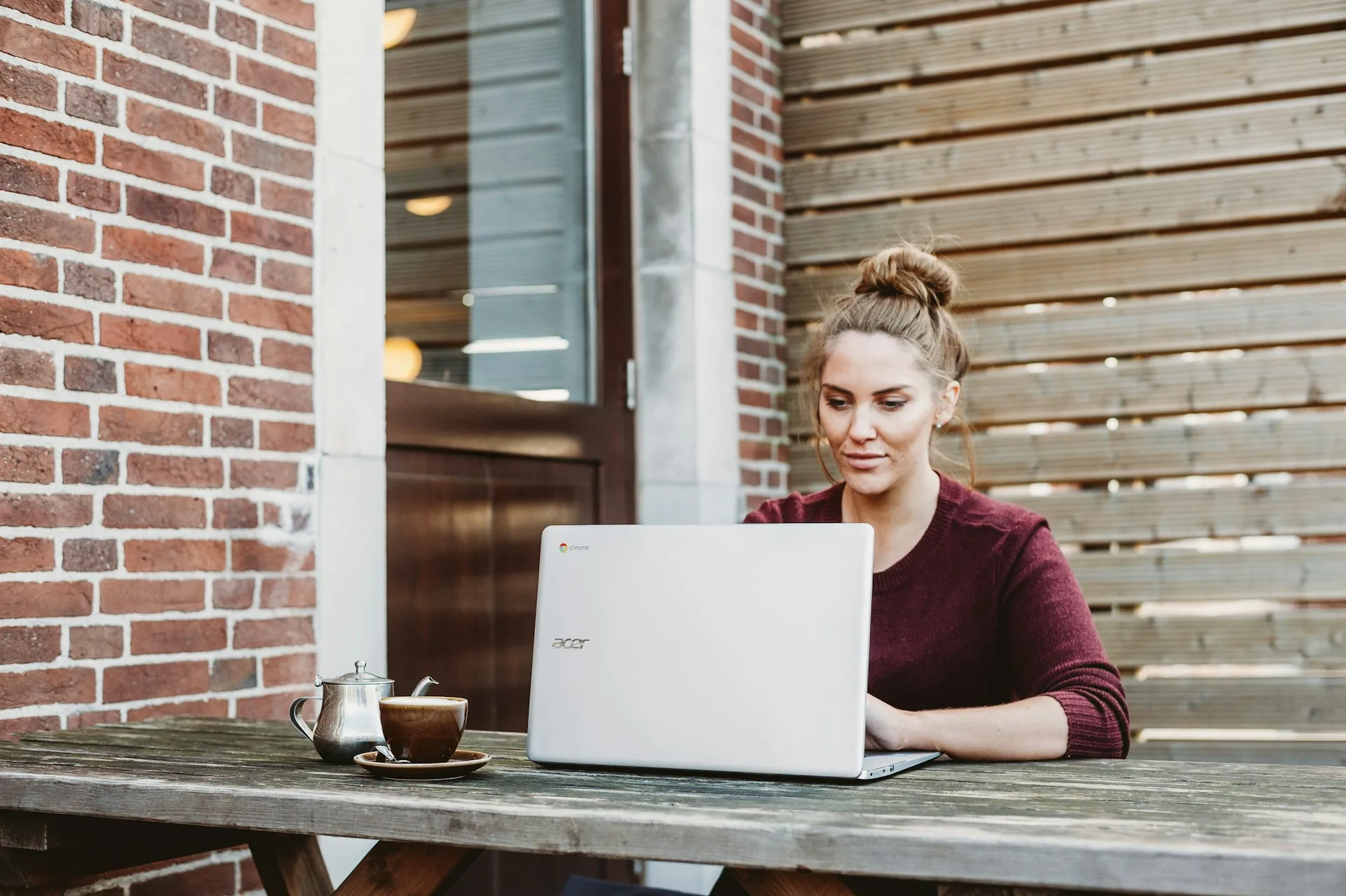 remote worker focused on cybersecurity at coffee shop