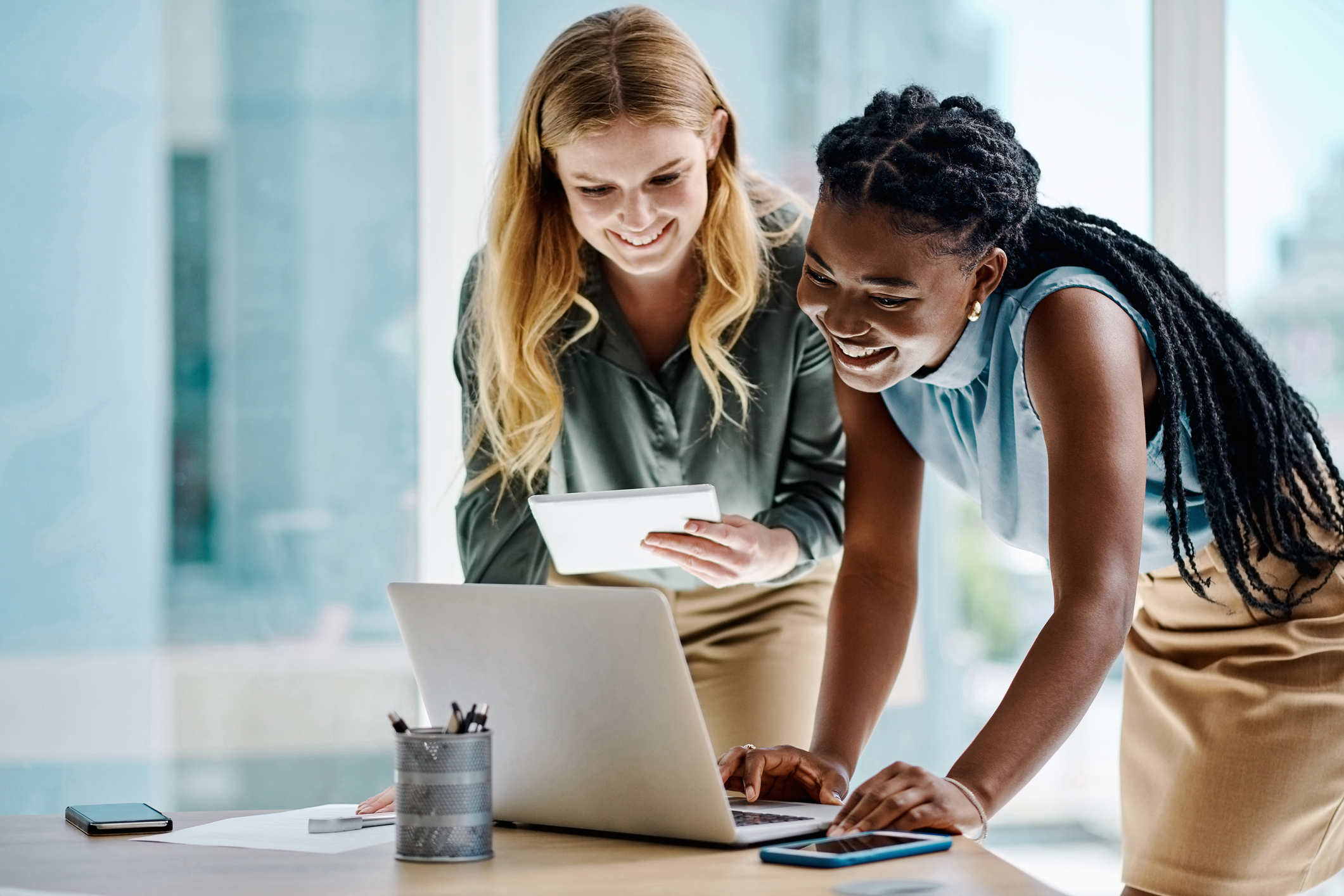 two women working on digital HR strategy