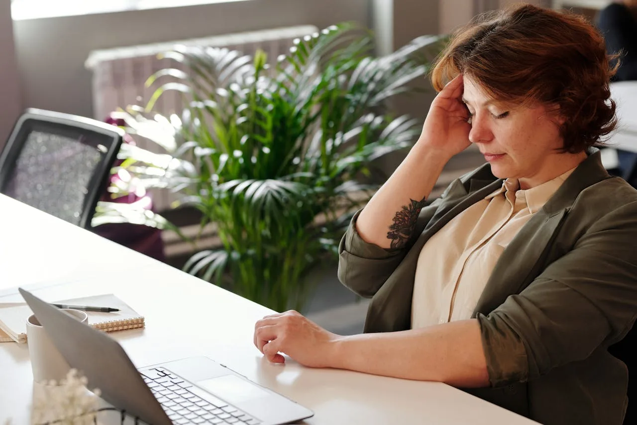 post-holiday stress shown on employee's face