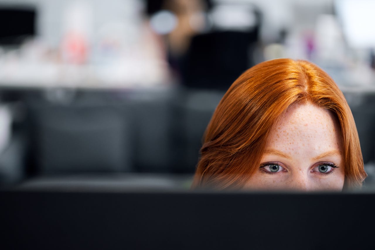 employee training looking closely at computer