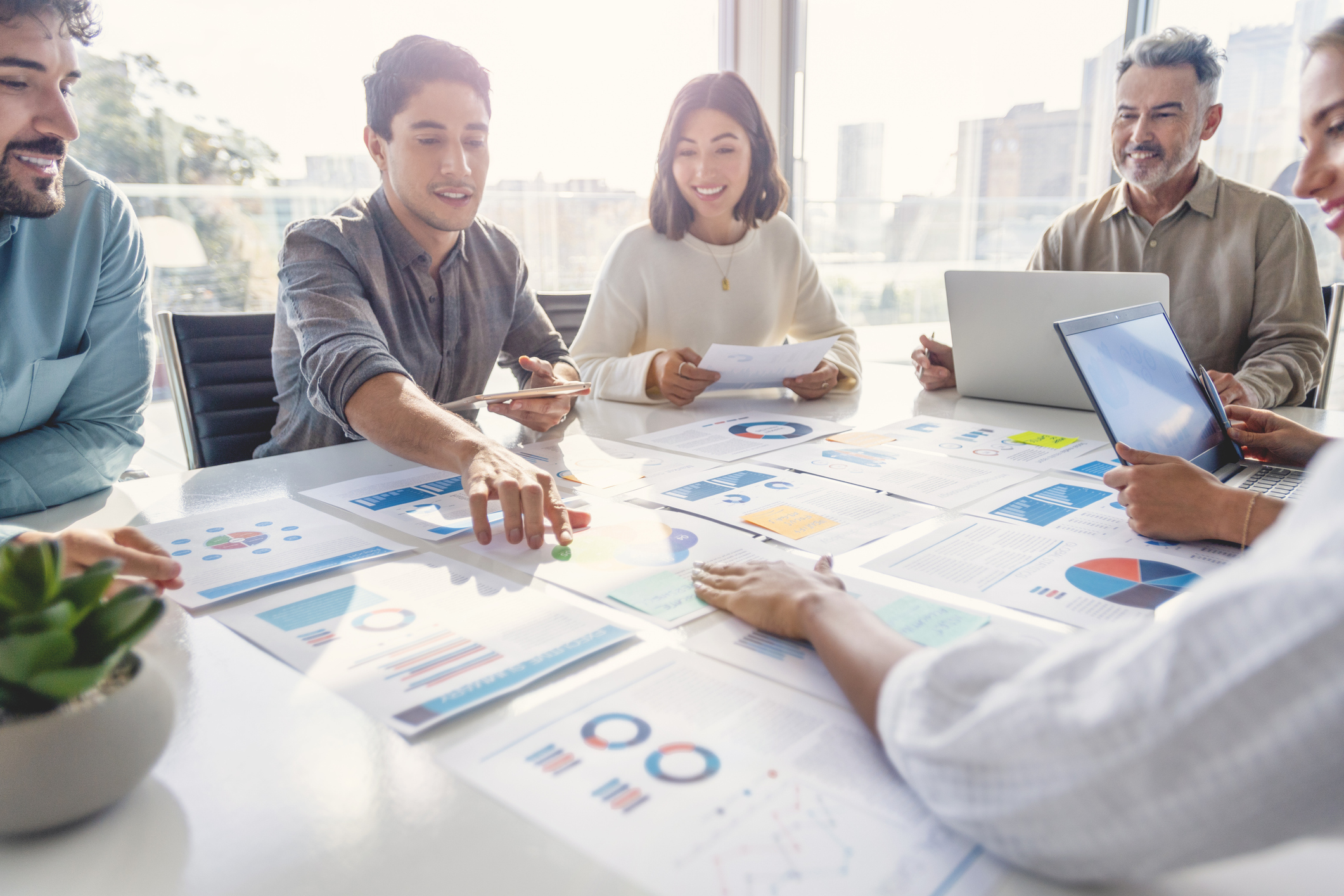 market research survey group results reviewed by team at work